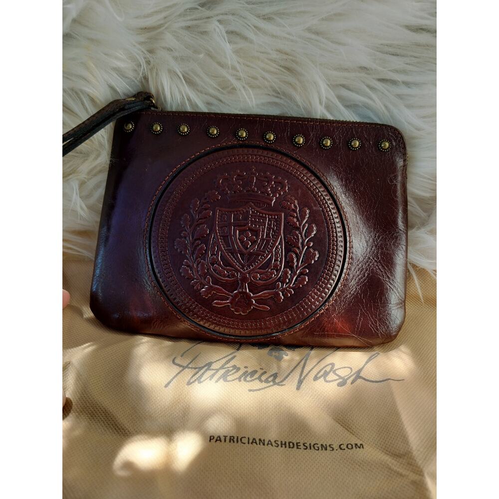5247) Patricia Nash Oxblood Cassini Leather Wristlet Embossed Stud Accents